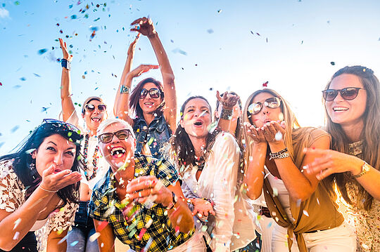 group of happy people mixed ages generations women having fun al